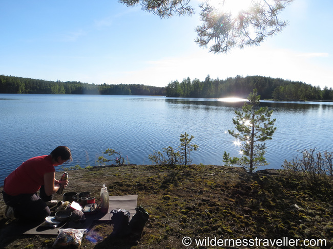 Cooking over a stove by the lake
